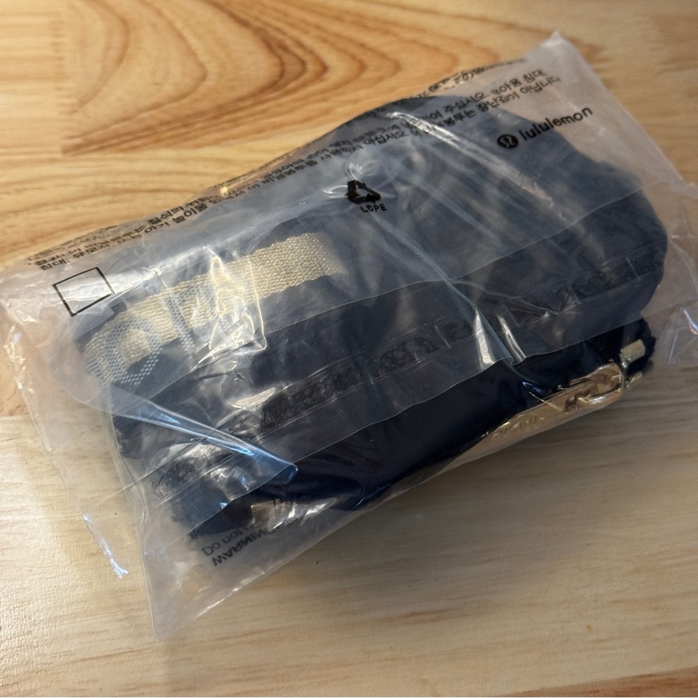 NWT Lululemon Dual Pouch Wristlet Black Gold Wordmark NWT - Picture 6 of 7